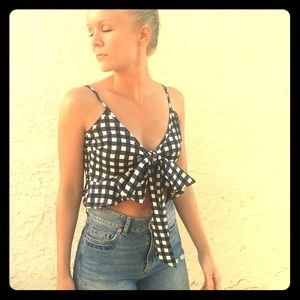 Tie front ruffle hem gingham top